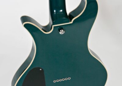 green electric guitar rear view