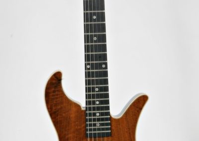 full view wood tone electric guitar
