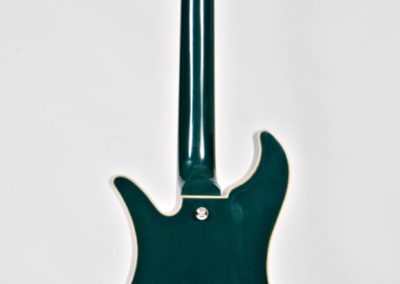 green electric guitar full rear view